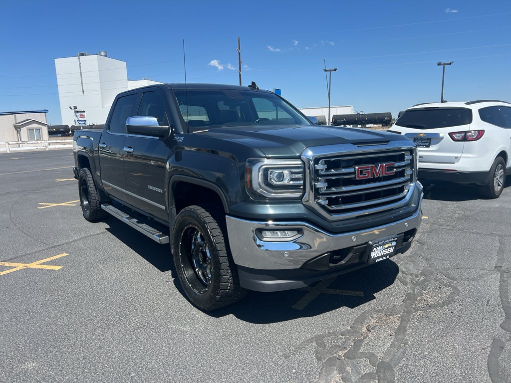2017 GMC Sierra 1500 SLT in Dark Slate Metallic — front three-quarter view